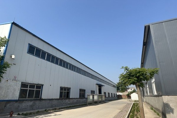 Modern industrial building with a clean, professional environment, representing advanced manufacturing