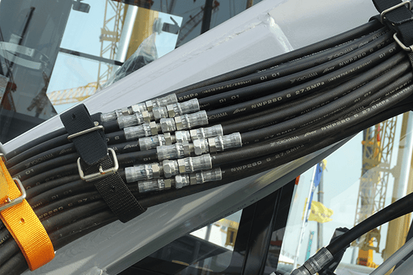 Complex hydraulic system with multiple hoses Industrial hydraulic connections in machinery